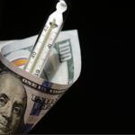 Make America great again? US dollarschein mit Fieberthermometer