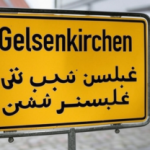 Arabisches-Ortsschild-300×208