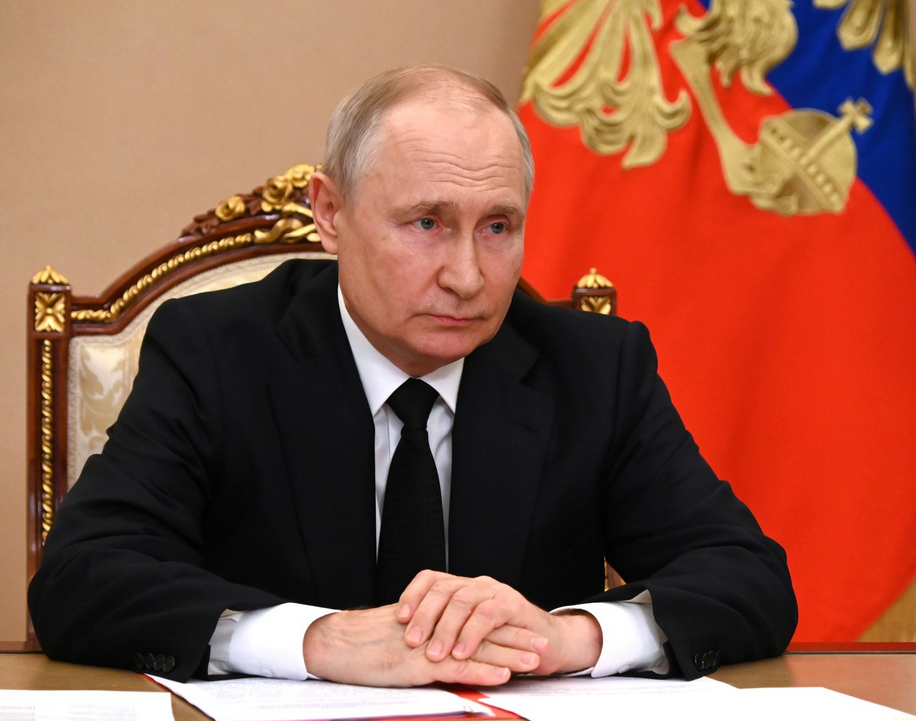 Präsident Putin konferiert