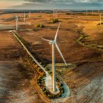 spain-wind-farm-wide-aerial-sunset-sunrise-yellow