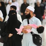 Young_Muslim_Couple_with_Toddler_at_Masjid_al-Haram_6_April_2015
